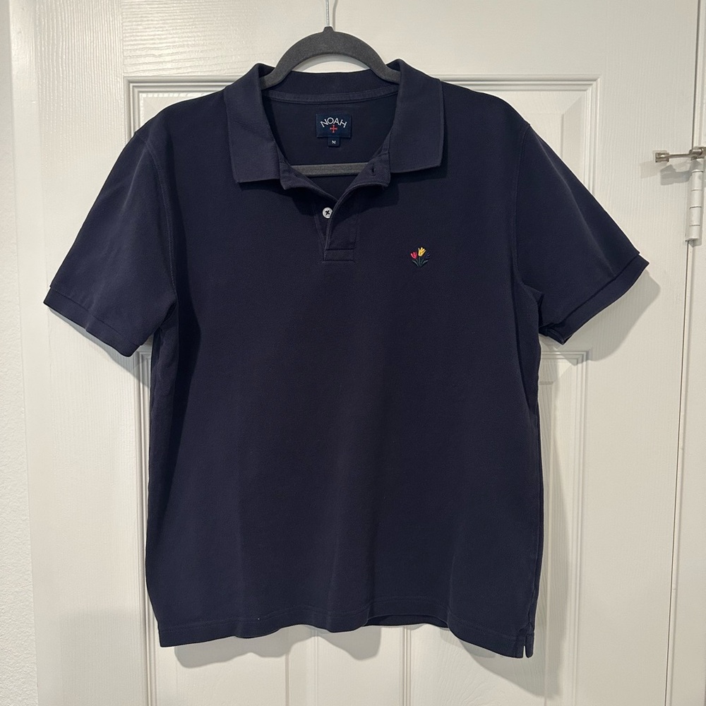 Noah NYC Navy Polo with Multicolor Tulip Logo